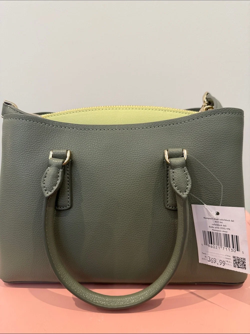 kate spade olive green leather satchel with yellow interior trim